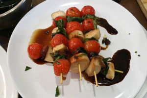 Light grilled cherry tomato in skewer